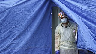 File photo: Medical works operate a testing tent at a COVID-19 mobile testing site in the Brooklyn borough of New York. Nov. 11, 2020.