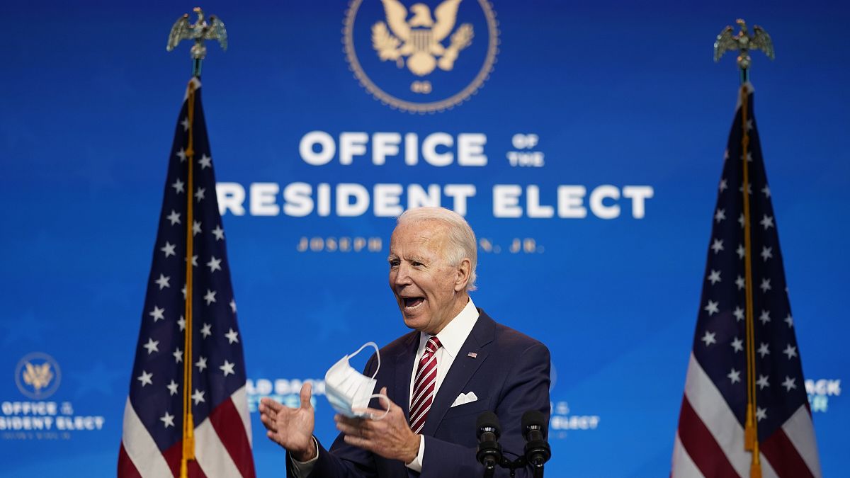 President-elect Joe Biden, accompanied by Vice President-elect Kamala Harris, speaks about economic recovery at The Queen theater, Monday, Nov. 16, 2020, in Wilmington, Del.