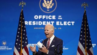 President-elect Joe Biden, accompanied by Vice President-elect Kamala Harris, speaks about economic recovery at The Queen theater, Monday, Nov. 16, 2020, in Wilmington, Del.