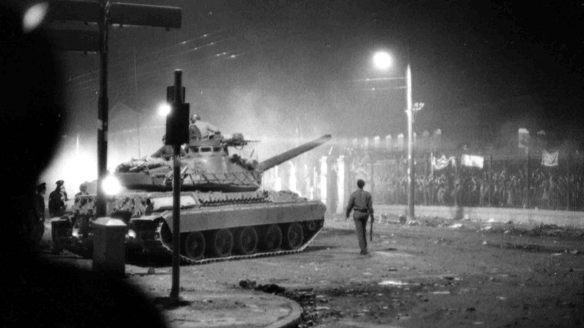 In this Nov. 17, 1973 file picture, army tanks prepare to drive through the gates of the Polytechnic Institute in Athens.