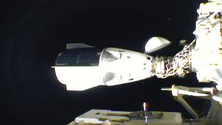 In this frame grab from NASA TV, the SpaceX Dragon is seen after docking at the International Space Station, late Monday, Nov. 16, 2020.
