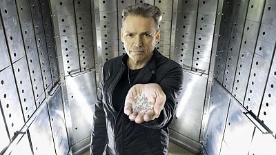Founder of founder of Sky Diamond Dale Vince is holding the carbon-negative, laboratory-grown diamonds.