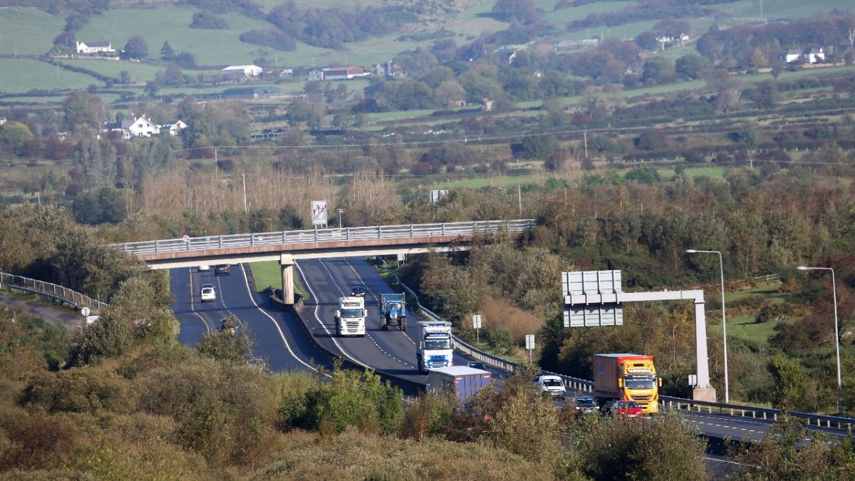 Motorists on the M1 motorway crossing the Irish border near Jonesborough, Republic of Ireland, looking across the border into Northern Ireland, Wednesday, Oct. 16, 2019.