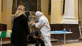 Girl getting tested for Covid-19 in a church in Naples, Italy