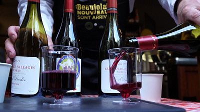 In Paris, a restaurateur serves Beaujolais Nouveau to take away