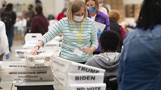 An election worker in Georgia sorts through ballots during a Cobb County hand recount of presidential votes on Sunday, November 15, 2020.