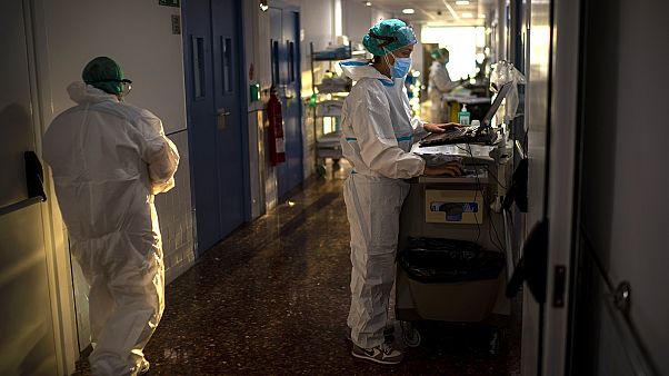 Nurse Marta Fernandez works at the COVID-19 ward at the hospital del Mar in Barcelona, Spain, Wednesday, November 18, 2020. Nurse Marta Fernandez works at the COVID-19 ward at the hospital del Mar in Barcelona, Spain, Wednesday, November 18, 2020.