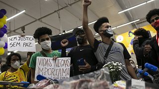 Activists including members of Black Lives Matter demonstrate inside a Carrefour supermarket against the murder of black man Joao Alberto Silveira Freitas.