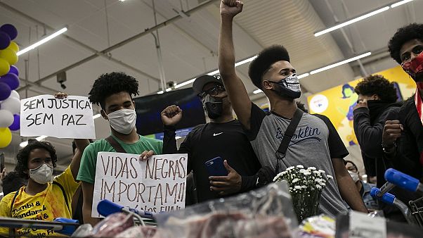 Activists including members of Black Lives Matter demonstrate inside a Carrefour supermarket against the murder of black man Joao Alberto Silveira Freitas. Activists including members of Black Lives Matter demonstrate inside a Carrefour supermarket against the murder of black man Joao Alberto Silveira Freitas.