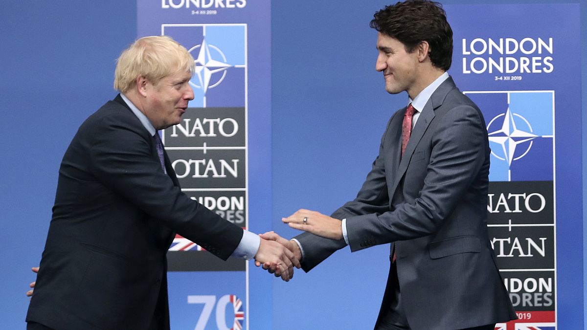 UK Prime Minister Boris Johnson (L) and Canadian Prime Minister Justin Trudeau during official arrivals for a NATO leaders meeting on Dec. 4, 2019.
