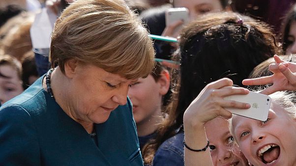 Angela Merkel egy berlini iskolában, 2016-ban Angela Merkel egy berlini iskolában, 2016-ban