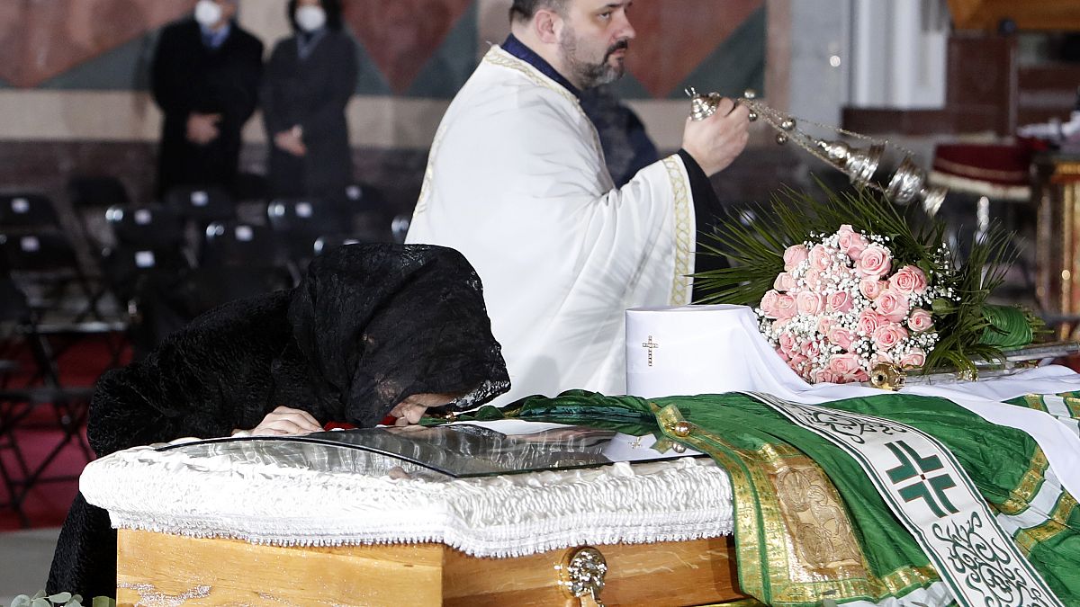 Thousands pay homage as Serbia's Patriarch is laid to rest after dying of COVID-19