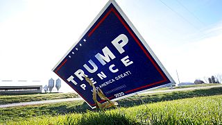 A sign in support of President Donald Trump is seen in the yard of Jasper County Republican Party chairman Thad Nearmyer, Thursday, Nov. 19, 2020, near Monroe, Iowa.