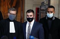 Alek Skarlatos, center, Anthony Sadler, right, and their lawyer Thibault de Montbrial at the Paris courthouse, Friday, Nov. 20, 2020.