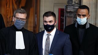 Alek Skarlatos, center, Anthony Sadler, right, and their lawyer Thibault de Montbrial at the Paris courthouse, Friday, Nov. 20, 2020.