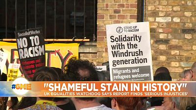 Sign reads 'Solidarity with the Windrush generation' at a demostration in London