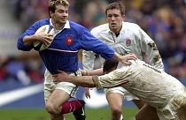 Le rugbyman français Christophe Dominici (à gauche) lors d'un match France-Angleterre le 19 février 2000 - photo d'archives