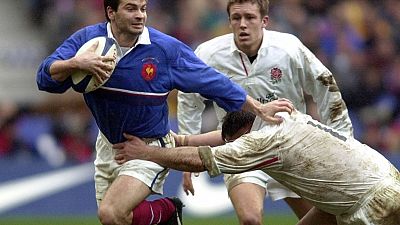 Le rugbyman français Christophe Dominici (à gauche) lors d'un match France-Angleterre le 19 février 2000 - photo d'archives
