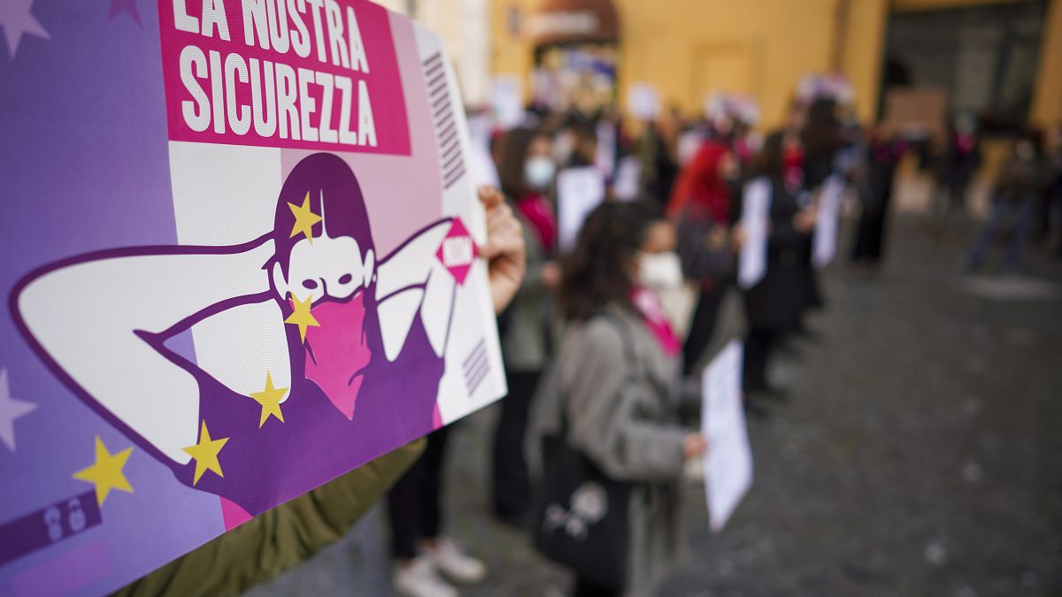 Women take part in a demonstration on the International Day for the Elimination of Violence against Women, in Rome, Wednesday, Nov. 25, 2020.