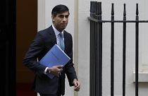 Britain's Chancellor Rishi Sunak leaves Downing Street to attend Parliament in London, Wednesday, Nov. 25, 2020.