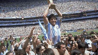 In this June 29, 1986 file photo, Diego Maradona celebrates winning the World Cup with Argentina after the team's 3-2 victory over West Germany in the final in Mexico City.