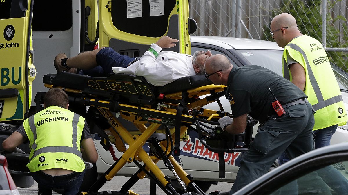 Ambulance staff take a man from outside a mosque in central Christchurch, New Zealand on March 15, 2019.