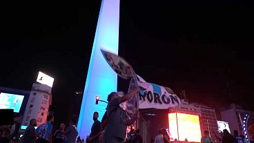 Crowds gather in Buenos Aires to pay tribute to Diego Maradona