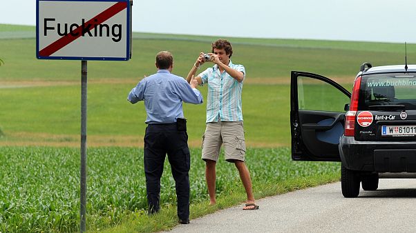 A sign marking the exit from the village of Fucking in Austria.