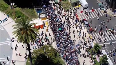Aerial images show fans forming a long queue to see Diego Maradona's