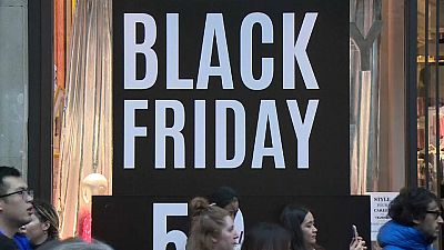 Shoppers search for 'Black Friday' bargains on London's Oxford Street, 23 November 2018