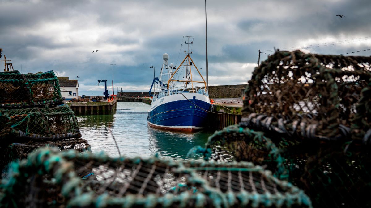  Jan. 28, 2020 photo, a fishing vessel is docked at Kilkeel harbor in Northern Ireland. 