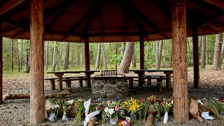 Flowers were left at the shelter where Phillip Mbuji Johansen was found on June 23 on the Danish island of Bornholm.