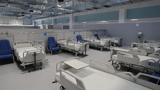 An apparatus sits covered with plastic in the empty Isabel Zendal new hospital during the official opening in Madrid, Spain, Tuesday, Dec. 1, 2020. 