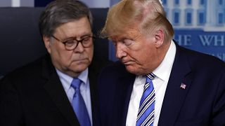In this March 23, 2020, file photo US Attorney General William Barr appears alongside President Donald Trump in the James Brady Briefing Room in Washington.
