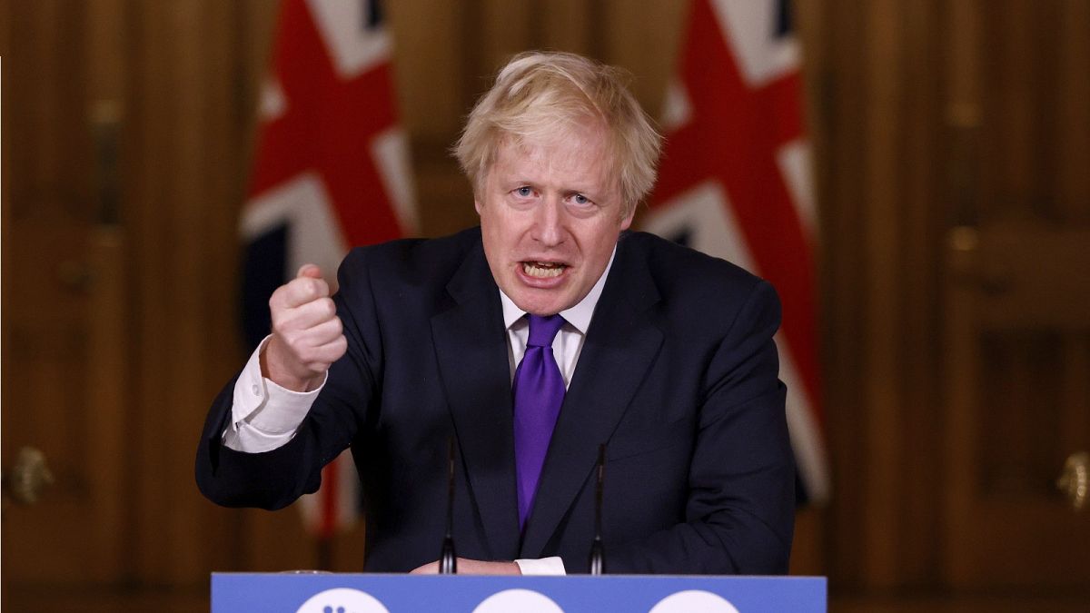 Boris Johnson speaks during a news conference on the ongoing situation with the coronavirus pandemic, at Downing Street in London, Wednesday Dec. 2, 2020.