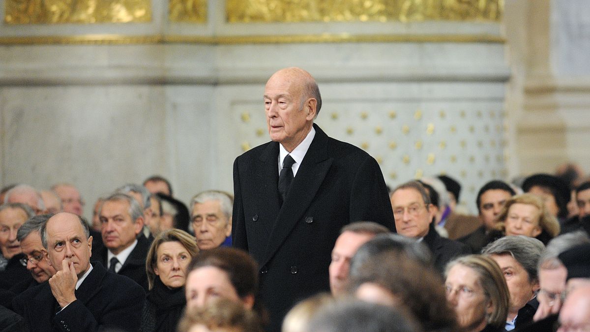 In this Jan. 11, 2010 photo Former French President Valery Giscard d'Estaing arrives for the funeral of Philippe Seguin, the President of the Court of Accounts, in Paris.