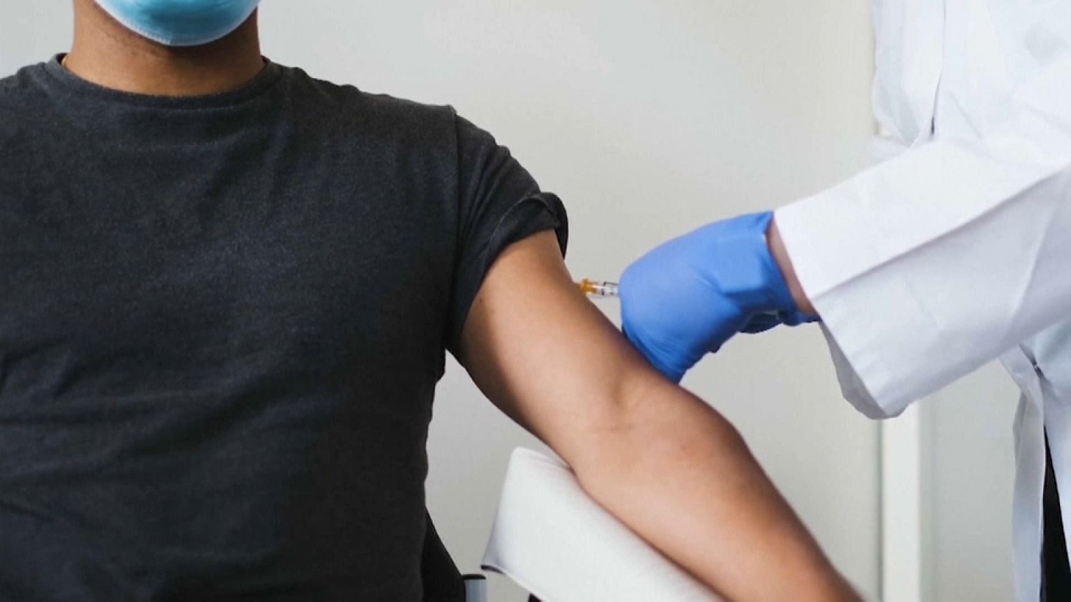 Trial participant being given the Pfizer/BioNTech vaccine