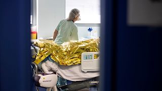A patient affected with the COVID-19 is being taken care in the ICU of the Nouvel Hopital Civil of Strasbourg, Nov. 6 2020.