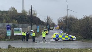 Police officers attend the scene of a "large" explosion near the UK city of Bristol. Dec. 3, 2020.