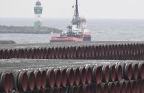 Pipes for the Nord Stream 2 Baltic Sea gas pipeline are stored on the premises of the port of Mukran near Sassnitz, Germany, Friday, Dec. 4, 2020.