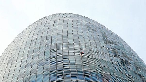 Man climbed a 33-storey tower Man climbed a 33-storey tower