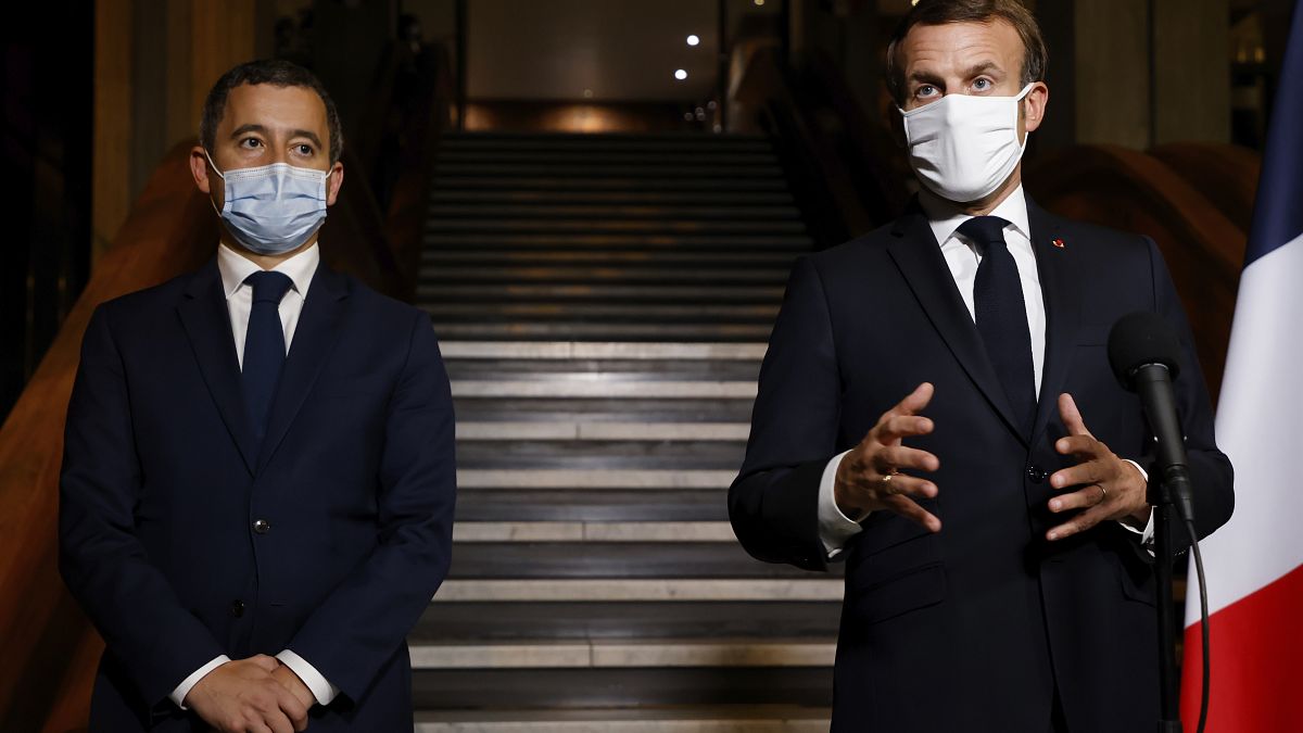 French President Emmanuel Macron (R) and Interior Minister Gerald Darmanin (L) on Oct. 20, 2020.
