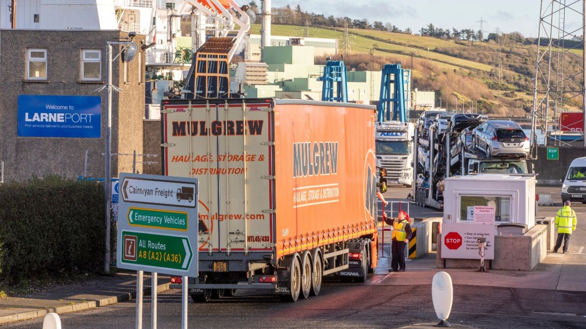 A lorry passes through security at the Port of Larne in Co Antrim, Northern Ireland, which handles travel and freight from Scotland, December 6, 2020. 
