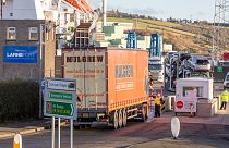 A lorry passes through security at the Port of Larne in Co Antrim, Northern Ireland, which handles travel and freight from Scotland, December 6, 2020. 
