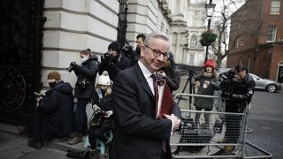 Britain's Chancellor of the Duchy of Lancaster Michael Gove walks back into Downing Street in London.