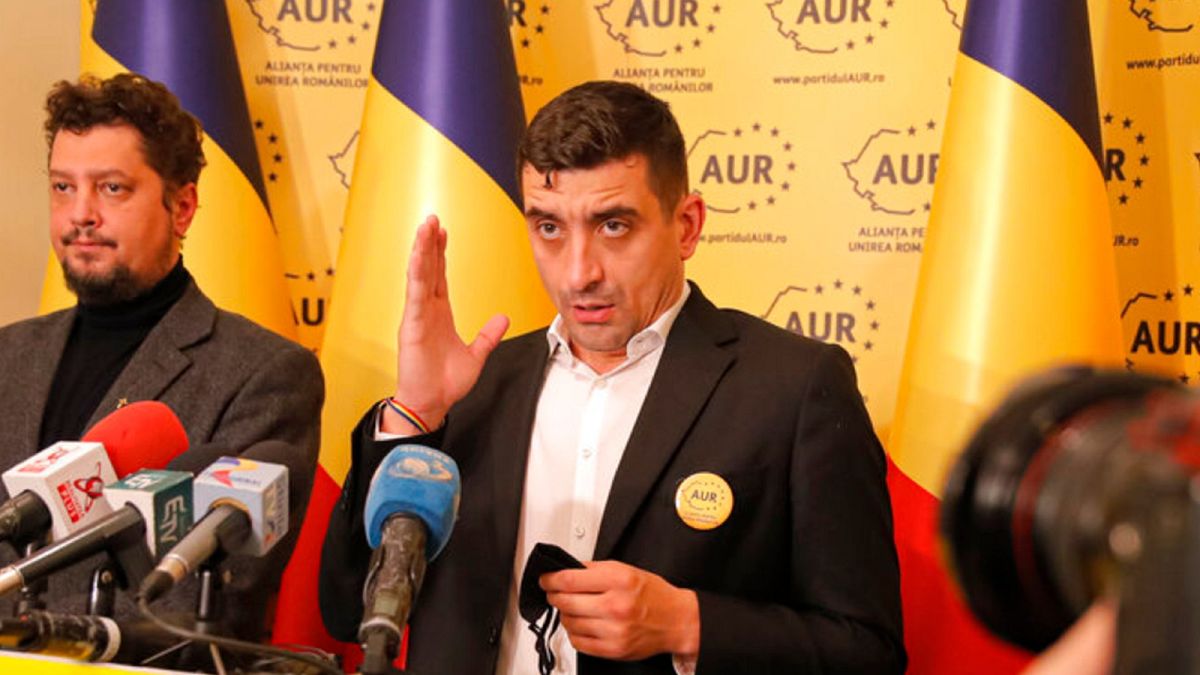 George Simion, right, and Claudiu Tarziu, the leaders of the Alliance for the Unification of Romanians (AUR)