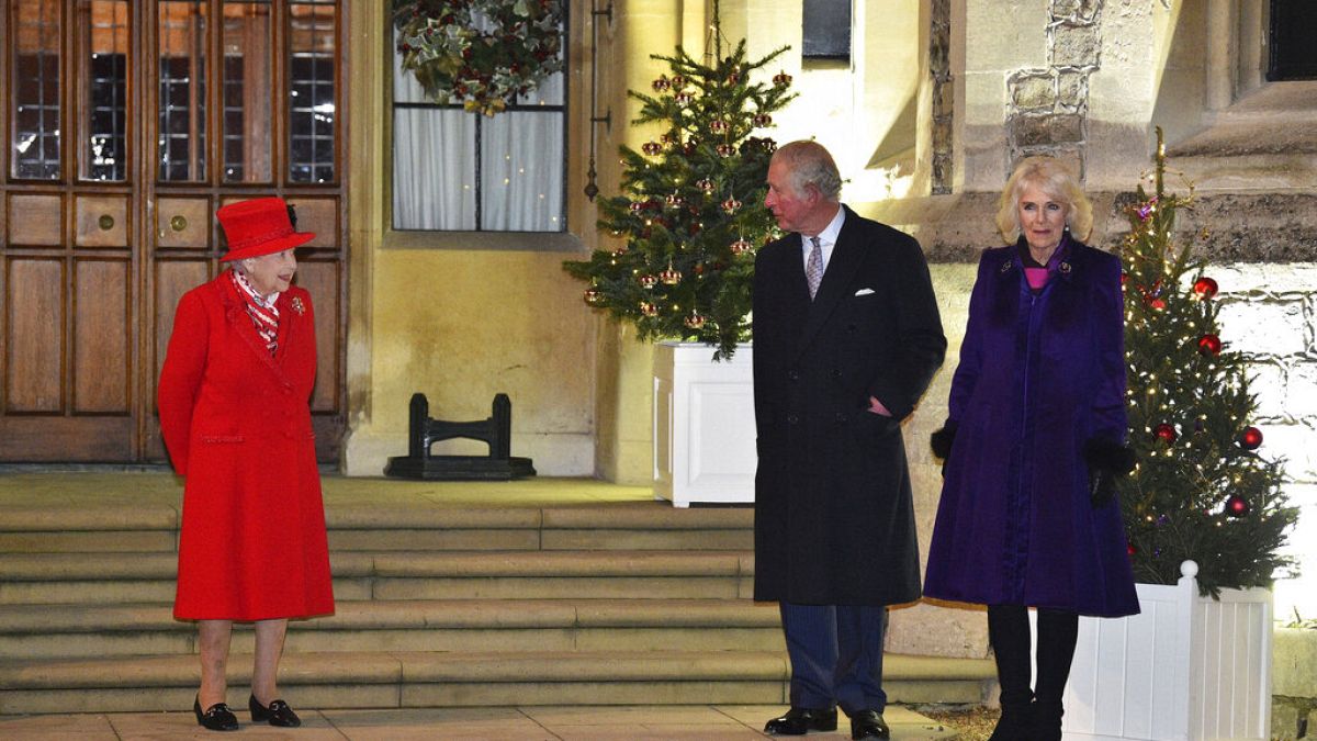 Queen Elizabeth II stood outside Windsor Castle with Prince Charles and Camilla.