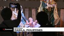 Un parc décoré pour Noël à Manille, aux Philippines, via AFP