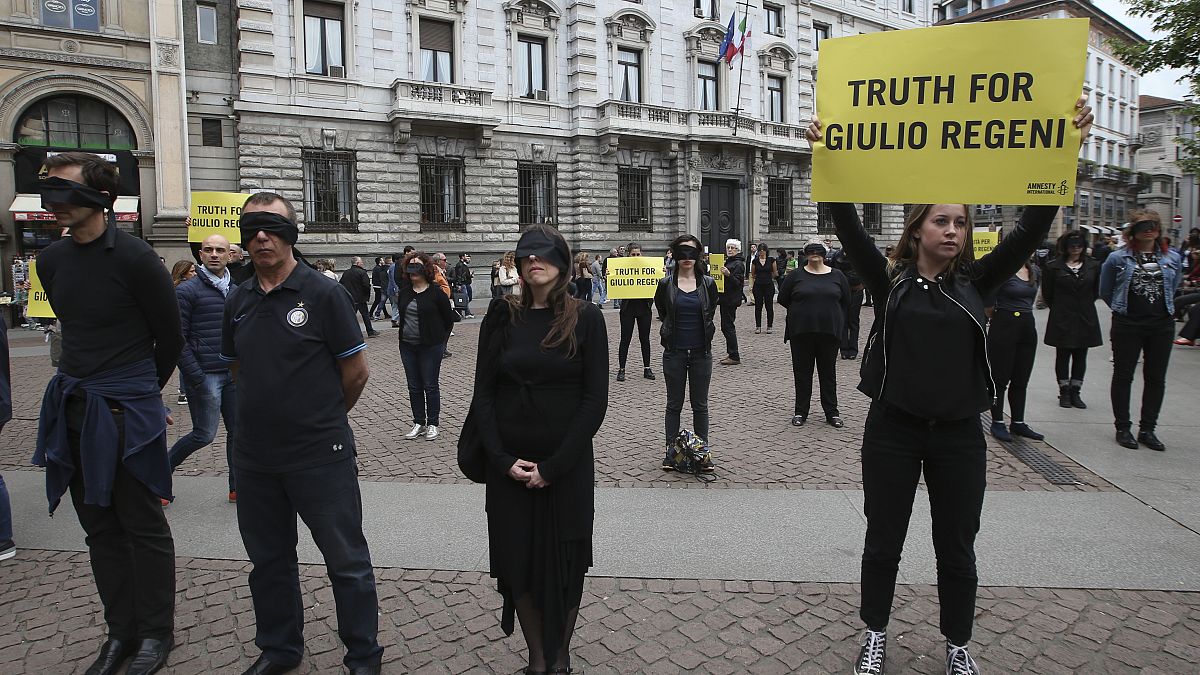 FILE - In this April 24, 2016 photo, activists stage a flash mob asking for truth on the death in Egypt of Italian student Giulio Regeni in front of Milan's city hall, Italy. 
