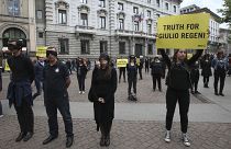 FILE - In this April 24, 2016 photo, activists stage a flash mob asking for truth on the death in Egypt of Italian student Giulio Regeni in front of Milan's city hall, Italy.